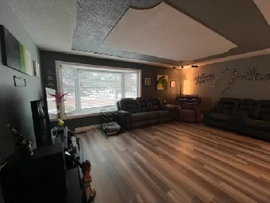 2bedroom main floor suite with garage and fenced yard image