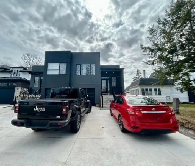 HIGH END BUILD Stunning Main Floor Unit with Garage image