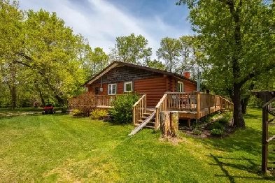 Charming 4Bdrm Log Home Situated on 432 Acres in Anola image