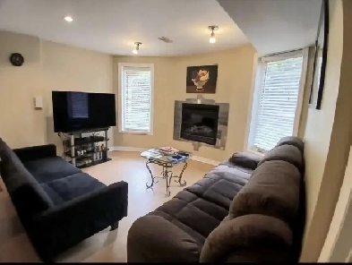 2 Bedroom Walkout Apartment  Garage All Utilities Included image
