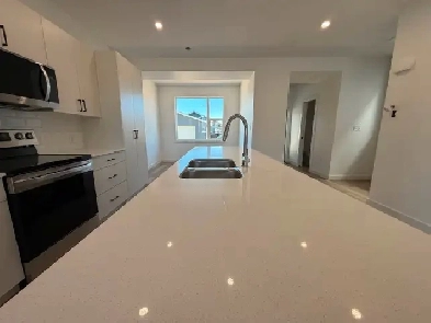 NEW 3 BEDROOM 25 BATH TOWNHOUSE IN BLACKFALDS image