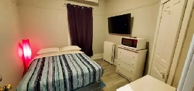 FURNISHED 12BEDROOM APARTMENTS IN DOWNTOWN EASTEND WIFI TV image