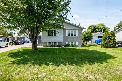 Meticulously Kept Raised Bungalow with Dream Detached Garage image