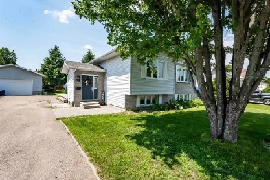 Meticulously Kept Raised Bungalow with Dream Detached Garage image