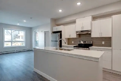 OFFERING NOW TOP FLOOR UNITS    1403 26A ST SW image
