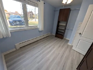 Walkout Basement ApartmentSeparateEntranceLaundryParking image