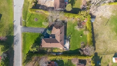 4Bed   Den Bungalow w Oversized Garage on  Acre  Greely image