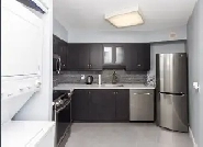 Fully Furnished Downtown Condo with Lake View Parking and more image