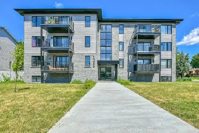 3 1/2 date flexible, stationnement intérieur, animaux accepté Image# 1