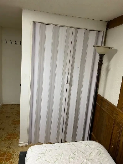 Private room is available for rent in a walkout basement. Image# 1