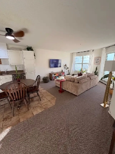 Bright, All-Inclusive 1 Bedroom   Large Den Condo Image# 1