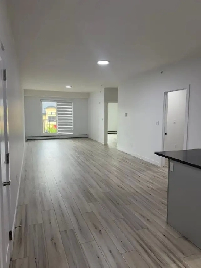 1 bedroom   Den  apartment in Beaumont Image# 1