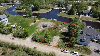 Premium 0.26acre lot in secure gated-community near Grand Beach! Image# 1
