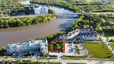 Rare Opportunity to Invest in a 120' x 167' Riverfront Lot! Image# 1