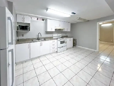 Spacious 2 Bed, 2 Bath Basement | Utilities & 2 Parking Included Image# 1
