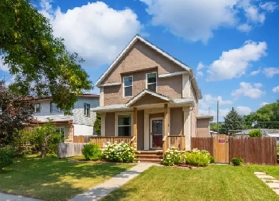Tastefully remodelled 3bdrm 2-storey w/ finished basement! Image# 1