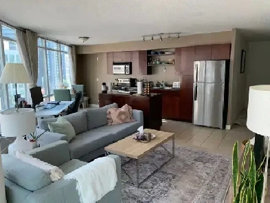 HUGE downtown 750 sq ft 1 Den Condo - Spadina & Front w parking Image# 1