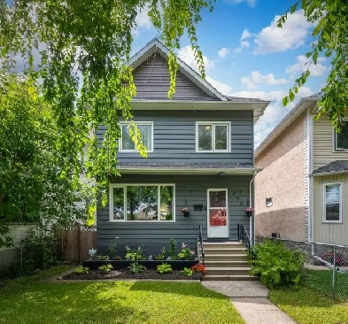 Beautifully updated 1531sqft 4bdrm home in the heart of West K! Image# 1